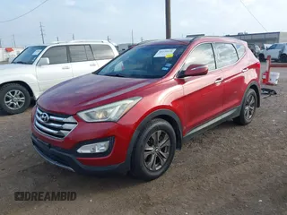 2014 Hyundai Santa Fe Sport with VIN 5XYZU3LB1EG151778, listed as a IAAI auction lot 41239120 with 195,220 mi miles. Bid and sale history available at carsss.com. Image 2.