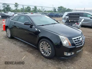 2014 Cadillac CTS Premium with VIN 1G6DH1E33E0102793, listed as a IAAI auction lot 42590306 with 88,582 mi miles and . Bid and sale history available at DreamBid. Image 1.