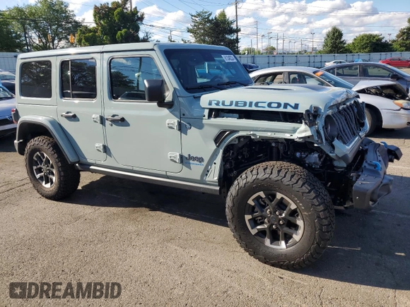 2024 Jeep Wrangler Rubicon z VIN 1C4RJXR64RW279791, wystawiony jako Copart lot #61348324 z przebiegiem 1 387 mil mil oraz Szkoda całkowita • Salvage title. Historia ofert i sprzedaży dostępna na DreamBid. Obrazek 4.
