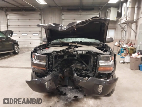2016 Chevrolet Silverado 1500 LT with VIN 3GCUKRECXGG216804, listed as a IAAI auction lot 41825811 with 127,217 mi miles and . Bid and sale history available at DreamBid. Image 12.