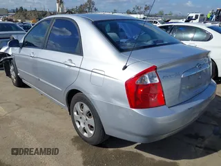 2005 Kia Spectra LX with VIN KNAFE122355139496, listed as a IAAI auction lot 41955660 with 58,676 mi miles. Bid and sale history available at carsss.com. Image 3.