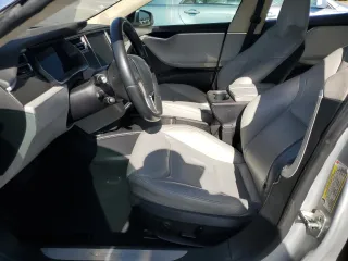 2016 Tesla Model S 90D с VIN 5YJSA1E27GF150737, выставлен на аукционе Copart как лот 53814915 с пробегом Не указан миль и Списание • Salvage title. История ставок и продаж доступна на DreamBid. Изображение 7.