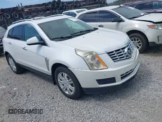 2014 Cadillac SRX Luxury Collection z VIN 3GYFNBE37ES596096, wystawiony jako IAAI lot #42205508 z przebiegiem 125 115 mil mil oraz . Historia ofert i sprzedaży dostępna na DreamBid. Obrazek 1.