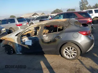 2015 Mazda 3 i Touring with VIN 3MZBM1L73FM145693, listed as a IAAI auction lot 41236304 with Not Provided miles and . Bid and sale history available at carsss.com. Image 13.
