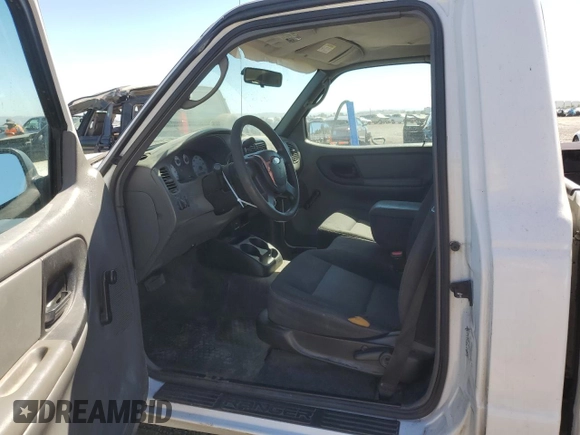 2004 Ford Ranger XL with VIN 1FTYR10U24PA08874, listed as a Copart auction lot 66931814 with 219,415 mi miles and Salvage title. Bid and sale history available at DreamBid. Image 7.