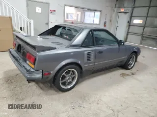 1989 Toyota MR2 z VIN JT2AW15C1K0150268, wystawiony jako Copart lot #86257134 z przebiegiem 93 969 mil mil oraz Tytuł czysty. Historia ofert i sprzedaży dostępna na DreamBid. Obrazek 3.