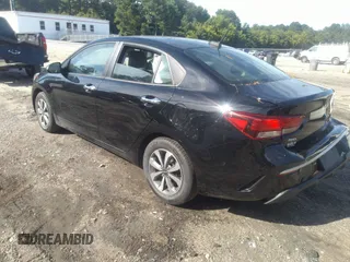 2023 Kia Rio S with VIN 3KPA24AD5PE531705, listed as a IAAI auction lot 39817112 with 73,997 mi miles. Bid and sale history available at carsss.com. Image 3.