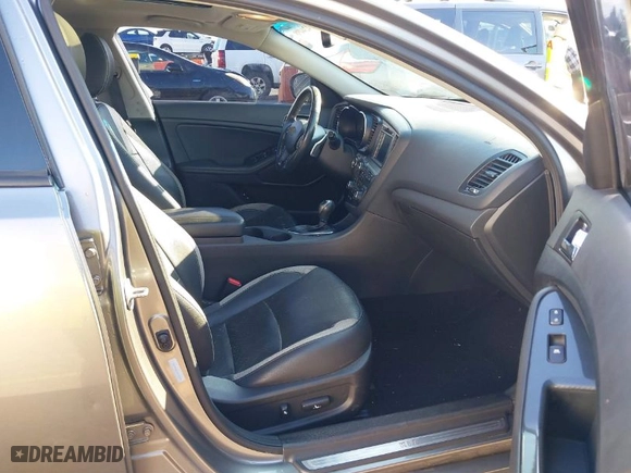 2013 Kia Optima SX w/Limited Pkg with VIN 5XXGR4A69DG190125, listed as a IAAI auction lot 41424498 with 134,056 mi miles. Bid and sale history available at carsss.com. Image 5.