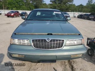 1997 Mercury Grand Marquis GS z VIN 2MELM74W2VX663313, wystawiony jako Copart lot #59539665 z przebiegiem 260 024 mil mil oraz Czysty tytuł • Clean title. Historia ofert i sprzedaży dostępna na DreamBid. Obrazek 5.