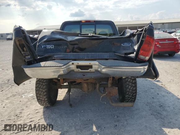 1999 Ford F-150 with VIN 1FTRX18W1XNA90998, listed as a Copart auction lot 59217415 with Not provided miles and Salvage title. Bid and sale history available at DreamBid. Image 6.