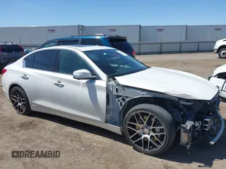 2014 Infiniti Q50 Hybrid Premium z VIN JN1AV7AP3EM690226, wystawiony jako IAAI lot #42259111 z przebiegiem 140 424 mil mil oraz . Historia ofert i sprzedaży dostępna na DreamBid. Obrazek 14.