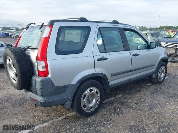 2005 Honda CR-V LX with VIN SHSRD68595U302483, listed as a IAAI auction lot 40528497 with 171,311 mi miles. Bid and sale history available at carsss.com. Image 4.