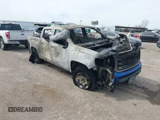 2018 GMC Canyon 2WD SLE z VIN 1GTG5CEA6J1274561, wystawiony jako IAAI lot #41796895 z przebiegiem Nie podano mil oraz . Historia ofert i sprzedaży dostępna na DreamBid. Obrazek 1.