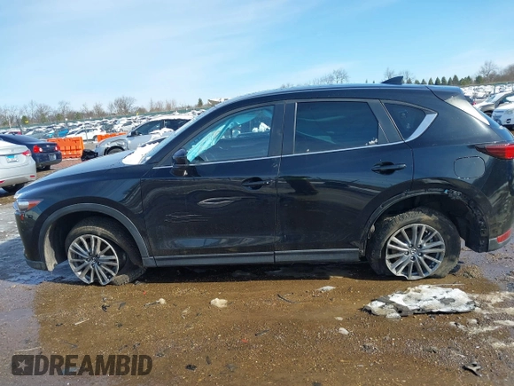 2020 Mazda CX-5 Touring with VIN JM3KFBCM5L0866189, listed as a IAAI auction lot 41829901 with 31,627 mi miles. Bid and sale history available at carsss.com. Image 14.