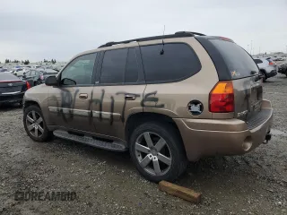 2003 GMC Envoy SLE with VIN 1GKDT13S432263407, listed as a Copart auction lot 44025825 with 154,266 mi miles and Salvage Title. Bid and sale history available at carsss.com. Image 2.