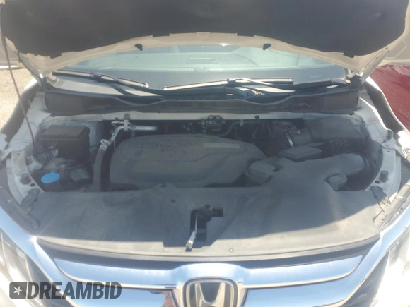 2018 Honda Odyssey EX-L z VIN 5FNRL6H78JB104144, wystawiony jako Copart lot #51513935 z przebiegiem 76 507 mil mil oraz Szkoda całkowita • Salvage title. Historia ofert i sprzedaży dostępna na DreamBid. Obrazek 14.