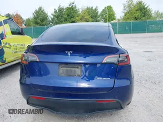 2022 Tesla Model Y Long Range z VIN 7SAYGDEE3NF455544, wystawiony jako IAAI lot #42123963 z przebiegiem 23 882 mil mil oraz . Historia ofert i sprzedaży dostępna na DreamBid. Obrazek 16.