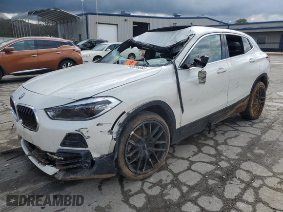 2022 BMW X2 sDrive28i with VIN WBXYH9C0XN5U53700, listed as a Copart auction lot 80884664 with 0 mi miles and Salvage Title. Bid and sale history available at carsss.com. Image 1.