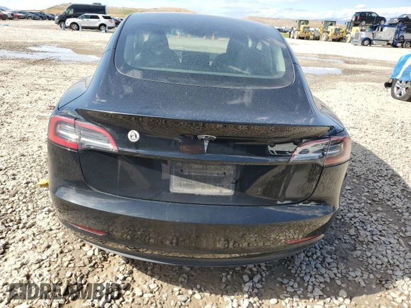2023 Tesla Model 3 with VIN 5YJ3E1EAXPF708001, listed as a Copart auction lot 57252735 with 71,579 mi miles and Salvage title. Bid and sale history available at DreamBid. Image 6.