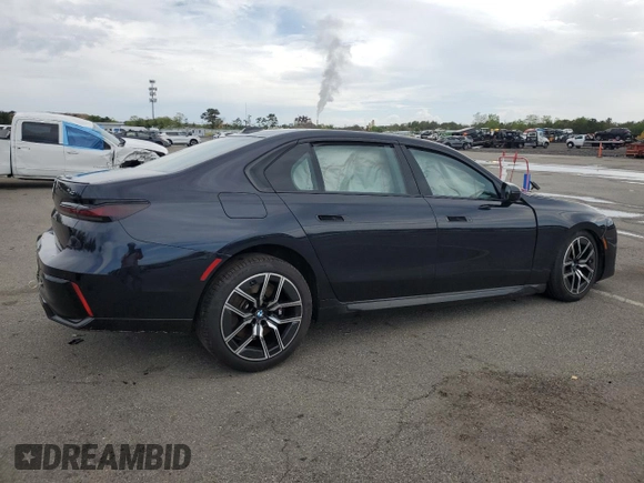 2024 BMW 7 Series 740i xDrive with VIN WBA33EH09RCR24113, listed as a Copart auction lot 56699365 with Not provided miles and Salvage title. Bid and sale history available at DreamBid. Image 3.