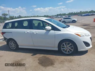 2013 Mazda 5 Touring with VIN JM1CW2CL8D0153437, listed as a IAAI auction lot 42181891 with 118,610 mi miles and . Bid and sale history available at DreamBid. Image 14.