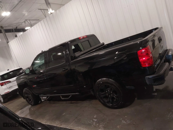 2015 Chevrolet Silverado 1500 LTZ with VIN 3GCUKSEJ9FG448699, listed as a IAAI auction lot 41372615 with 156,010 mi miles. Bid and sale history available at carsss.com. Image 14.