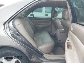 2004 Toyota Camry LE with VIN 4T1BE30K24U921028, listed as a IAAI auction lot 42187174 with 295,174 mi miles and . Bid and sale history available at DreamBid. Image 8.