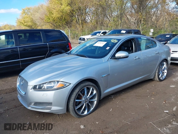 2013 Jaguar XF V6 SC with VIN SAJWJ0EF6D8S81203, listed as a IAAI auction lot 40783947 with 77,727 mi miles. Bid and sale history available at carsss.com. Image 2.