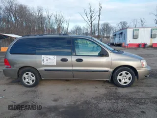 2005 Ford Freestar SE z VIN 2FMZA51645BA05742, wystawiony jako IAAI lot #41429194 z przebiegiem 145 415 mil mil oraz . Historia ofert i sprzedaży dostępna na DreamBid. Obrazek 13.