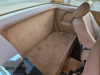 1987 Mercedes-Benz 560 with VIN WDBBA48D5HA061899, listed as a Copart auction lot 76554184 with 68,292 mi miles and Salvage Title. Bid and sale history available at carsss.com. Image 6.