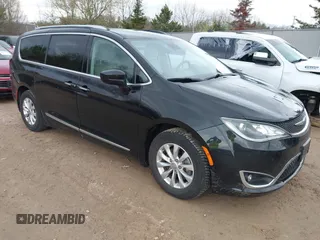 2018 Chrysler Pacifica Touring L z VIN 2C4RC1BG3JR233506, wystawiony jako IAAI lot #42186208 z przebiegiem 74 198 mil mil oraz . Historia ofert i sprzedaży dostępna na DreamBid. Obrazek 1.