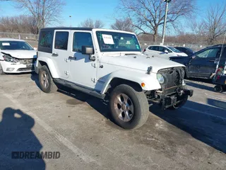 2013 Jeep Wrangler Unlimited Sahara with VIN 1C4BJWEG3DL658530, listed as a IAAI auction lot 41421006 with 115,321 mi miles and . Bid and sale history available at DreamBid. Image 1.