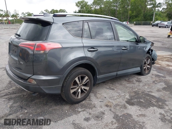 2017 Toyota RAV4 XLE with VIN JTMWFREVXHD096998, listed as a IAAI auction lot 41997925 with 119,564 mi miles and . Bid and sale history available at DreamBid. Image 4.
