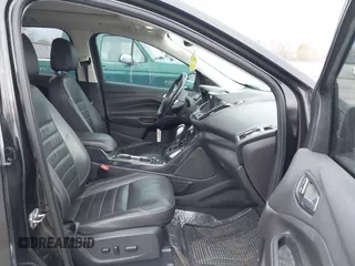 2015 Ford Escape Titanium with VIN 1FMCU9J96FUA27221, listed as a IAAI auction lot 41925276 with 180,758 mi miles and . Bid and sale history available at carsss.com. Image 5.