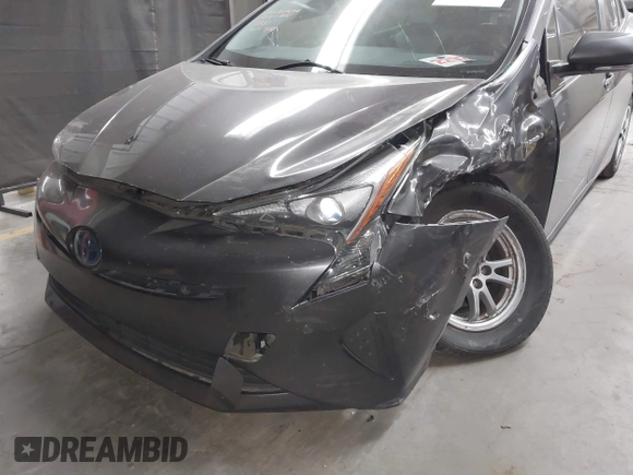 2018 Toyota Prius Two with VIN JTDKARFU6J3553871, listed as a IAAI auction lot 41577636 with 118,715 mi miles. Bid and sale history available at carsss.com. Image 6.