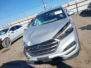 2016 Hyundai Tucson SE with VIN KM8J33A42GU238820, listed as a IAAI auction lot 41657093 with 47,319 mi miles. Bid and sale history available at carsss.com. Image 12.