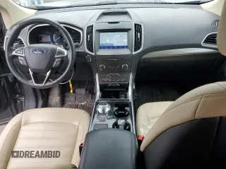2020 Ford Edge SEL z VIN 2FMPK4J93LBB36067, wystawiony jako Copart lot #49913935 z przebiegiem 83 557 mil mil oraz Czysty tytuł • Clean title. Historia ofert i sprzedaży dostępna na DreamBid. Obrazek 8.