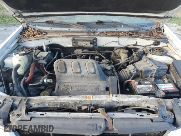 2002 Mazda Tribute LX with VIN 4F2YU09182KM09244, listed as a Copart auction lot 76758954 with Not Provided miles and Non Repairable. Bid and sale history available at carsss.com. Image 12.