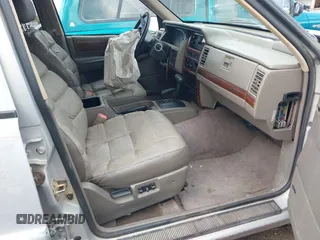 1995 Jeep Grand Cherokee Limited with VIN 1J4GZ78Y3SC649231, listed as a IAAI auction lot 41763953 with 140,889 mi miles. Bid and sale history available at carsss.com. Image 5.