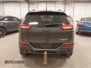 2015 Jeep Cherokee Trailhawk с VIN 1C4PJMBSXFW525218, выставлен на аукционе IAAI как лот 42032130 с пробегом 164 289 миль миль и . История ставок и продаж доступна на DreamBid. Изображение 16.