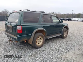 1999 Toyota 4Runner SR5 z VIN JT3HN86R4X0256990, wystawiony jako IAAI lot #41314366 z przebiegiem 362 268 mil mil oraz . Historia ofert i sprzedaży dostępna na DreamBid. Obrazek 4.