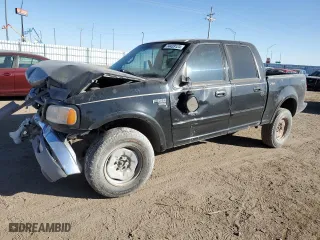 2001 Ford F-150 SuperCrew XLT with VIN 1FTRW08L61KC30586, listed as a Copart auction lot 74439124 with 296,321 mi miles and Salvage Title. Bid and sale history available at carsss.com. Image 1.