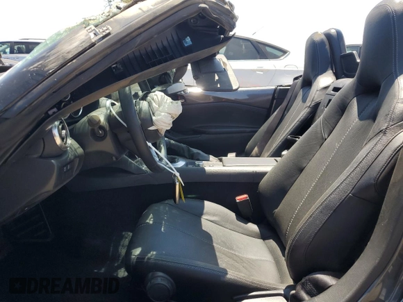 2021 Mazda MX-5 Miata Grand Touring with VIN JM1NDAD79M0458827, listed as a Copart auction lot 62238855 with 20,497 mi miles and Salvage title. Bid and sale history available at DreamBid. Image 7.