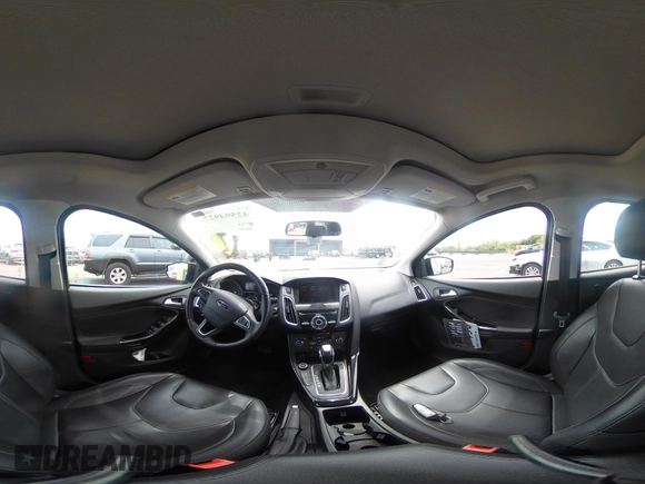 2017 Ford Focus Titanium z VIN 1FADP3N24HL326330, wystawiony jako IAAI lot #42594927 z przebiegiem 54 727 mil mil oraz . Historia ofert i sprzedaży dostępna na DreamBid. Obrazek 18.