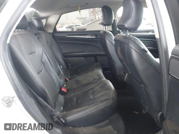 2019 Ford Fusion Titanium with VIN 3FA6P0K90KR236674, listed as a IAAI auction lot 42008633 with 99,737 mi miles and . Bid and sale history available at DreamBid. Image 8.