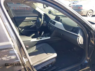2013 BMW 3 Series 328i xDrive with VIN WBA3B5G53DNS04643, listed as a IAAI auction lot 42143365 with 107,448 mi miles. Bid and sale history available at carsss.com. Image 5.