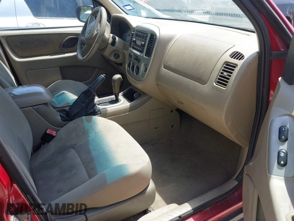 2005 Ford Escape XLT with VIN 1FMYU031X5KE17077, listed as a IAAI auction lot 42260075 with 234,758 mi miles and . Bid and sale history available at DreamBid. Image 5.