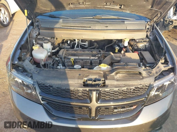 2019 Dodge Journey SE z VIN 3C4PDCBB8KT858387, wystawiony jako IAAI lot #42051620 z przebiegiem 76 126 mil mil oraz . Historia ofert i sprzedaży dostępna na DreamBid. Obrazek 10.