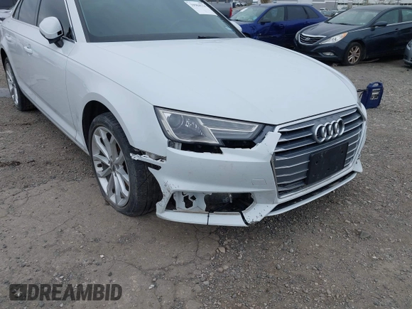 2019 Audi A4 Premium with VIN WAUGMAF48KA061335, listed as a IAAI auction lot 41275476 with 82,853 mi miles and . Bid and sale history available at DreamBid. Image 6.