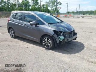 2019 Honda Fit EX z VIN 3HGGK5H89KM736677, wystawiony jako IAAI lot #42443401 z przebiegiem 58 559 mil mil oraz . Historia ofert i sprzedaży dostępna na DreamBid. Obrazek 1.